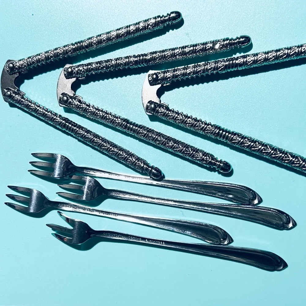 VTG   Lot 3 Metal Handheld Nut Crackers  and 4 Small Forks